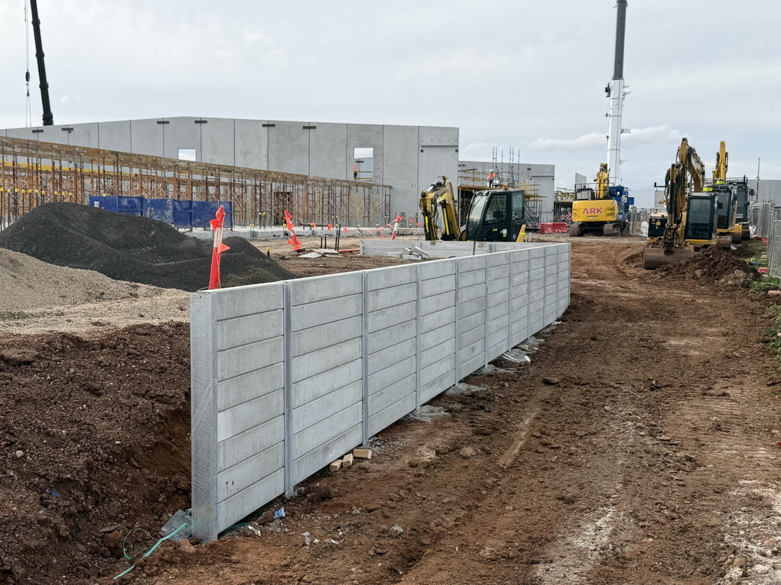 Concrete sleepers and galvanised steel posts used together