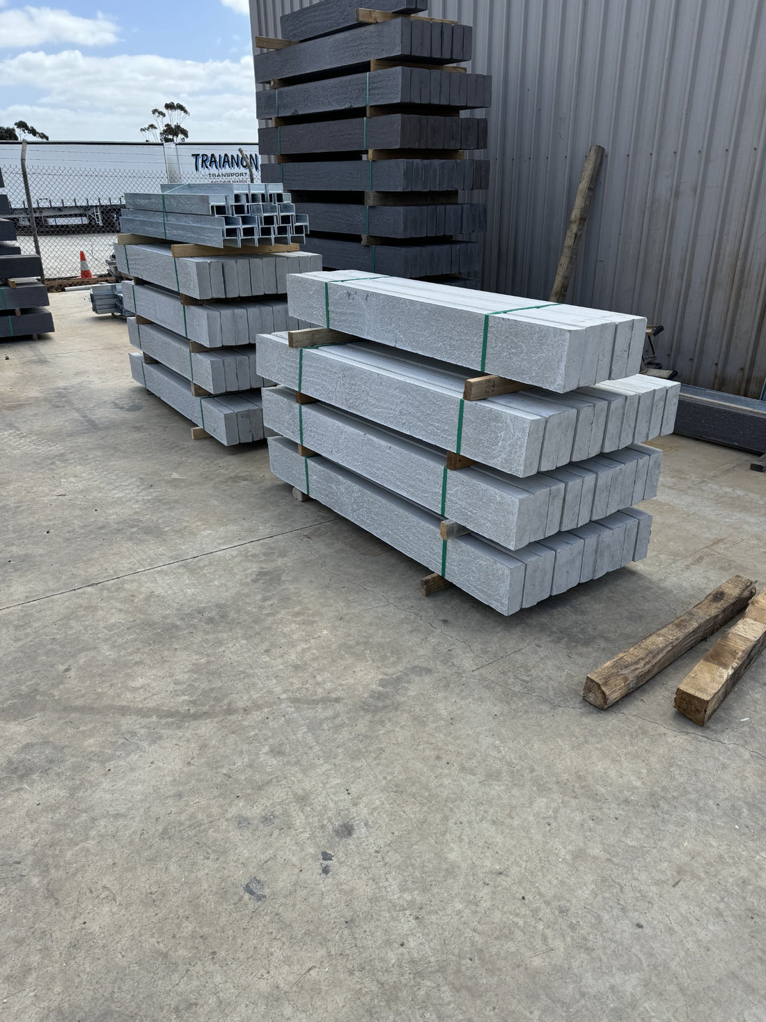 Plain and charcoal concrete sleeper bundles at our supply yard